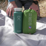 big agnes q core next to a water bottle