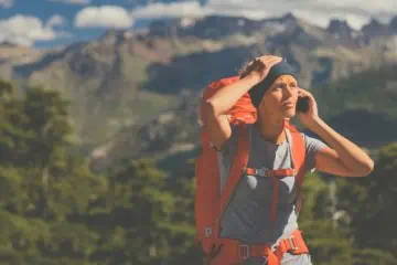 hiker on the phone