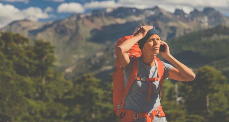 hiker on the phone