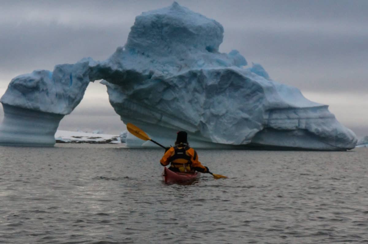 kayaking between icebergs in Antarctica